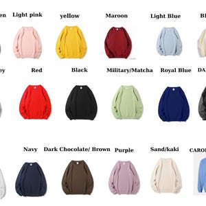 May include: A collection of crewneck sweatshirts in various colors, including forest green, light pink, yellow, maroon, light blue, and beige. Additional colors are sport grey, red, black, military/matcha, royal blue, dark grey, white, navy, dark chocolate/brown, purple, sand/khaki, and carolina blue.