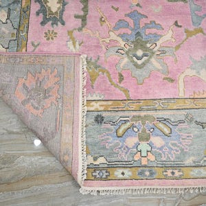Handmade Pink Oushak Wool Rug: Pastel Floral Turkish Knot