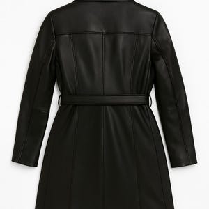 May include: A black faux leather coat with a notched collar and a matching belt. The coat features long sleeves and vertical seams for a tailored look. The coat is a knee-length design.