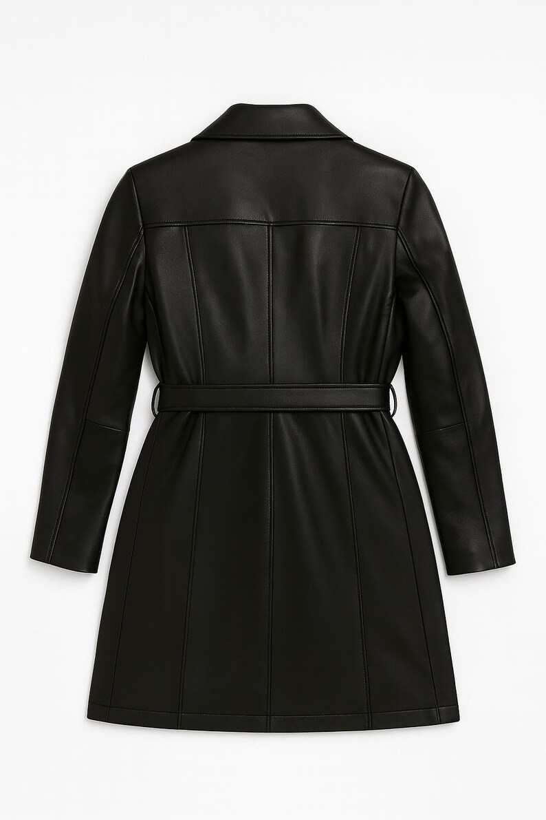 May include: A black faux leather coat with a notched collar and a matching belt. The coat features long sleeves and vertical seams for a tailored look. The coat is a knee-length design.