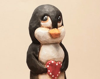 Hand carved wood small  penguin figurine with heart