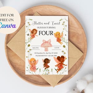 May include: A whimsical invitation card with the text "Flutter and Twirl" and "Olivia is turning FOUR". The design features watercolor illustrations of fairies, a mushroom, and floral accents. The card is set on a wooden tray with a kraft paper envelope.