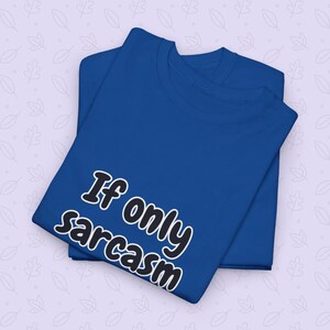A person modeling a relaxed-fit workout graphic tee with the funny quote "If only sarcasm burned calories" printed across the chest. A top choice for a humorous workout shirt and a great funny gym t-shirt for fitness lovers who enjoy sarcastic humor and comfortable clothing.
