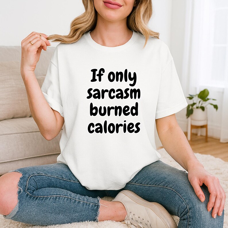 Close-up of a relatable and funny top featuring the witty phrase "If only sarcasm burned calories" in a chunky, fun font. This if only sarcasm burned calories tee makes a fantastic gift for gym rats and sarcastic friends looking for unique fitness apparel.