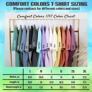 May include: A color chart for Comfort Colors 1717 T-shirts, featuring various colors like light green, moss, blue jean, and black. The chart includes sizing information for widths ranging from 18.25 to 27.75 inches and lengths from 26.62 to 32.5 inches.