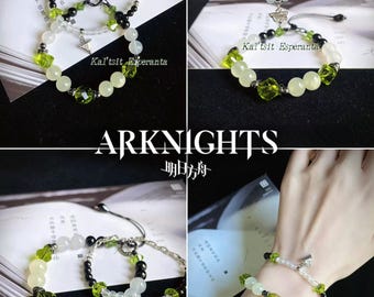 May include: Jewelry set featuring bracelets and a necklace with green, white, and black beads. The bracelets have a star charm and the text "Kal'tsit Esperanta". The word "ARKNIGHTS" is also visible.