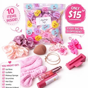 May include: A pink-themed mystery bag with makeup, skincare, hair accessories, and jewelry. The bag includes scrunchies, lip gloss, and more. The text on the bag says "Mystery Bag" and "Surprise Inside!"