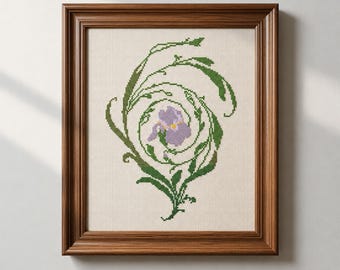 Motif floral vert en spirale au point de croix