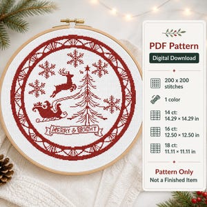 May include: A cross-stitch pattern in a wooden hoop featuring a red Christmas design. The design includes a reindeer, sleigh, Christmas tree, snowflakes, and the text "MERRY & BRIGHT". The PDF pattern is a digital download.
