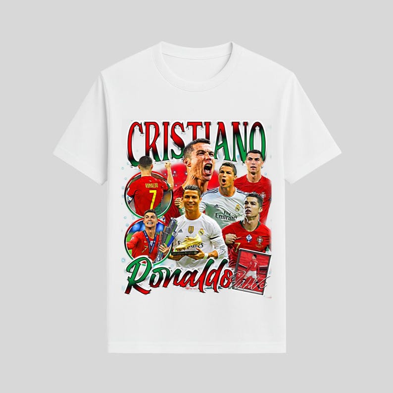 May include: White t-shirt featuring a collage of images of Cristiano Ronaldo, with the name "Cristiano Ronaldo" in red and green script. The design includes images of Ronaldo in various soccer uniforms.