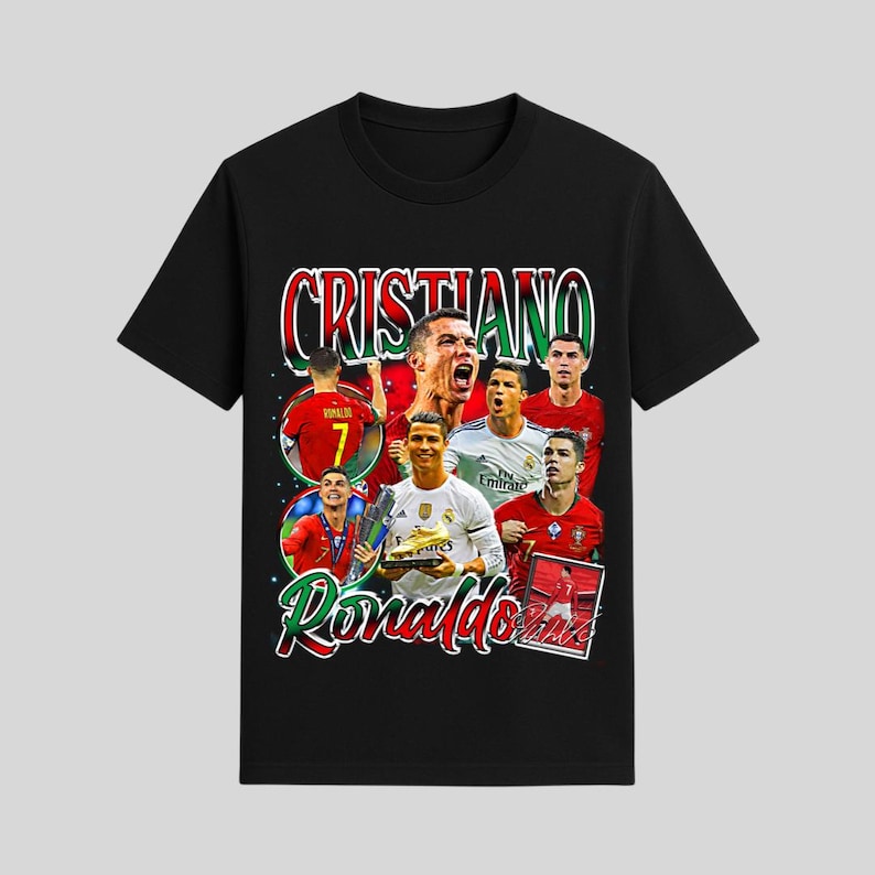 May include: Black t-shirt featuring a collage of images of Cristiano Ronaldo, with the name "Cristiano Ronaldo" in red and green lettering. The shirt showcases various action shots and portraits of the soccer star.