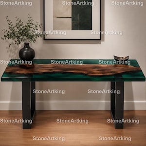 May include: A rectangular wooden table with a live edge design. The table has a dark wood centre and a vibrant green resin border. It is supported by black metal legs, creating a modern aesthetic.