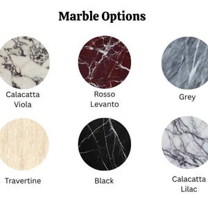 Puede incluir: Imagen que muestra seis opciones de m&aacute;rmol: Calacatta Viola, Rosso Levanto, Grey, Travertino, Black y Calacatta Lilac. Cada muestra de m&aacute;rmol es circular, con el nombre del tipo de m&aacute;rmol debajo.