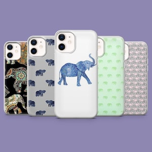 May include: A collection of phone cases with elephant designs. The cases feature various patterns, including a blue watercolor elephant, repeating elephant silhouettes, and ornate elephant motifs in black and gold. The cases are displayed against a purple background.