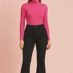 Black Flared Denim Jeans with Distressed Hem – High Waist Spanish Style