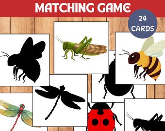 May include: Insect shadow matching game with 24 cards. The game features colourful insect illustrations and their corresponding black silhouettes. Includes a grasshopper, bee, dragonfly, and ladybug.