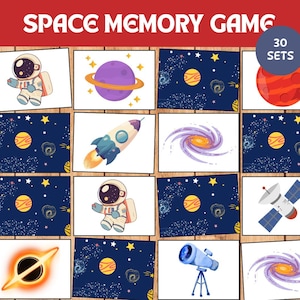 以下が含まれることがあります： 「SPACE MEMORY GAME」の文字が上部にある宇宙をテーマにしたメモリーゲーム。惑星、宇宙飛行士、ロケット、銀河、望遠鏡のイラストが描かれたカードが30セットあります。カードはグリッド状に配置されています。