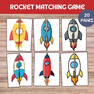 Könnte beinhalten: Ein Rocket Matching Game mit 20 Paaren, das Illustrationen von bunten Raketen auf weißen Karten zeigt. Jede Karte enthält ein geteiltes Raketendesign in Gelb, Blau, Grau, Rot und Weiß mit orangefarbenen Flammen für ein Zuordnungsspiel.