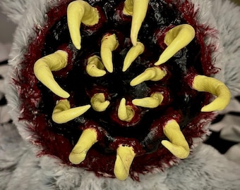 horror bear gory toothy doll creature