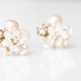 mishuntley reviewed Little Mother of Pearl Flower and Rhinestone Cluster Stud Earrings