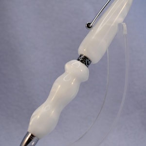 A Sculptured Pen in Transparent White with Chrome Plated Accents