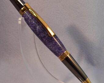 Sierra pen crafted from Midnight Purple acrylic, featuring sleek gun metal and timeless lifetime gold accents.