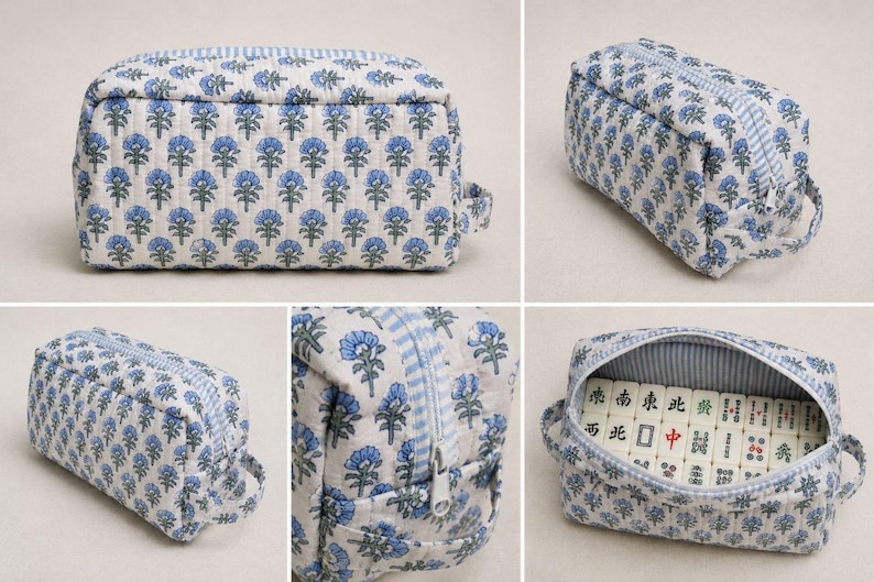 Blue floral quilted mahjong tile storage bag with striped zipper trim and padded cotton design, shown in multiple product views including close-up details and spacious interior holding American mahjong tiles.