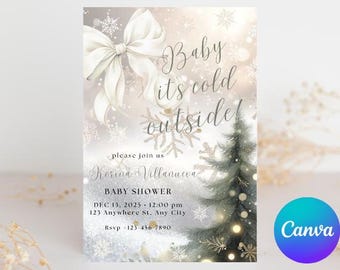 May include: A baby shower invitation with a winter theme. The design features a large white bow, snowflakes, and a Christmas tree. The text reads "Baby it's cold outside!" and includes event details. The Canva logo is in the bottom right corner.