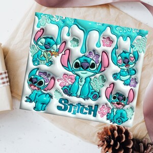 May include: A square white plaque featuring multiple illustrations of the blue alien character Stitch in various poses, accented by pink hibiscus flowers, green leaves, and a turquoise liquid drip effect at the top with the word Stitch in blue.