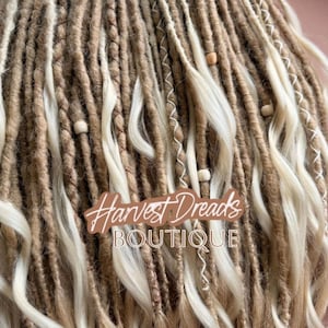 a close-up view of a collection of braided and twisted hair strands, with the text "Harvest Dreads Boutique" prominently displayed in the center.