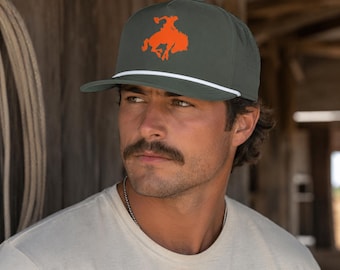 Sombrero vaquero de rodeo estilo western con diseño de caballo naranja