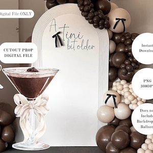 May include: Digital file featuring a cutout prop of a cocktail, with the text "A tini bit older." The image includes a martini glass with a bow, and balloons in shades of brown and cream. The file is an instant download, PNG, 300 DPI.