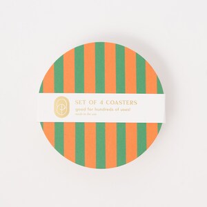May include: Set of four green and orange striped coasters. The coasters are made in the USA and are good for hundreds of uses.
