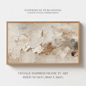 May include: A rectangular framed artwork with a textured abstract design in neutral tones of beige, white, and brown. The artwork is labeled "VINTAGE INSPIRED FRAME TV ART" and "SIZED TO 16:9 (3840 X 2160)". The frame is made of light-colored wood.