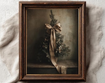 May include: A framed print featuring a small Christmas tree adorned with a large, draped ribbon. The tree is set against a muted background, with the text "PAPERMUSE PUBLISHING" and "CURATED VINTAGE INSPIRED PRINTS" at the bottom.