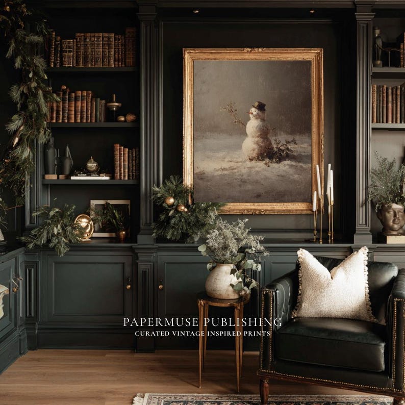 May include: A dark green library interior with built-in bookshelves, a framed painting of a snowman, and a leather armchair. The room is decorated with greenery and candles, creating a cozy, vintage aesthetic. The text "PAPERMUSE PUBLISHING" is visible.