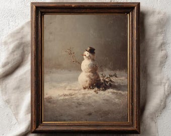 May include: Framed vintage print of a snowman in a snowy landscape. The snowman wears a small top hat and has a carrot nose. The artwork is in a dark wooden frame and features the text "PAPERMUSE PUBLISHING" at the bottom.