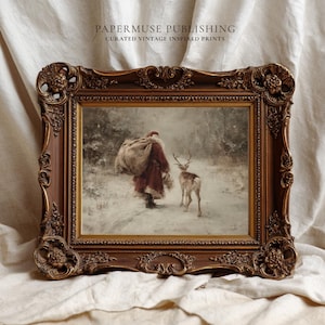 Puede incluir: Una impresi&oacute;n vintage enmarcada que representa a Pap&aacute; Noel caminando por un bosque nevado con un ciervo. La impresi&oacute;n est&aacute; en un marco marr&oacute;n decorativo con detalles ornamentados. El texto "PAPERMUSE PUBLISHING CURATED VINTAGE INSPIRED PRINTS" est&aacute; en la parte superior.