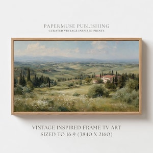 May include: A framed landscape painting of rolling green hills, trees, and a building under a blue sky with clouds. The artwork is in a light wood frame. Text at the top reads "PAPERMUSE PUBLISHING CURATED VINTAGE INSPIRED PRINTS". Text at the bottom reads "VINTAGE INSPIRED FRAME TV ART SIZED TO 16:9 (3840 X 2160)".