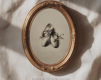 May include: An oval, gold-colored ornate frame surrounds a pencil sketch of ballet slippers. The artwork is set against a neutral background. The text "PAPERMUSE PUBLISHING" and "CURATED VINTAGE INSPIRED PRINTS" is at the bottom of the image.