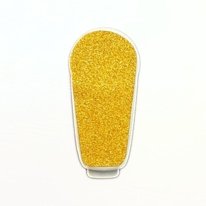 May include: A gold glitter object in the shape of a beverage, with a white border. The object is set against a white background. The gold glitter gives the object a sparkling appearance.