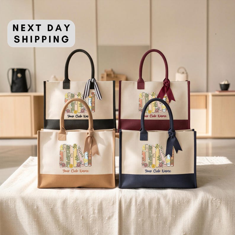 four handbags with a unique design, each featuring a book illustration and the text "Your Club Name" printed on them. The handbags are arranged on a table, and there is a "Next Day Shipping" sign in the background.