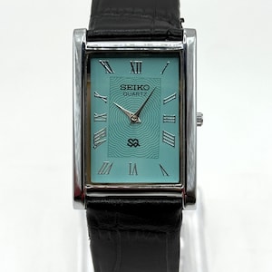 Vintage Seiko Slim Quartz Rectangular Blue Dial Leather Band Men's Wrist Watch
