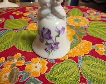 vintage Russ Berrie porcelain miniature bell featuring a lovebird topper and purple violet flowers