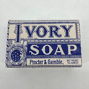 May include: A rectangular box of Ivory Soap with blue and white graphics. The word "IVORY" is at the top, and "SOAP" is below it. The box also features the Procter & Gamble logo and the text "NET WEIGHT 9 1/2 OUNCES."