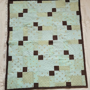 Handmade patchwork baby quilt