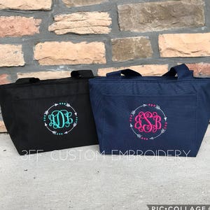 May include: Two black and navy blue insulated lunch bags with white arrows and monograms in turquoise and pink. The bags have a zipper closure and two handles. The text "3FF CUSTOM EMBROIDERY" is visible at the bottom of the image.