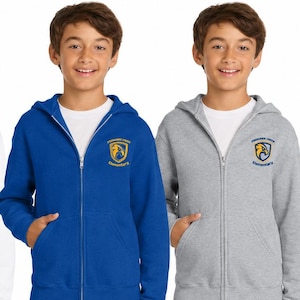 May include: Four zip-up hoodies in white, blue, gray, and light blue. Each hoodie has a hood, front pockets, and a school emblem on the left chest. The hoodies are worn with blue jeans.