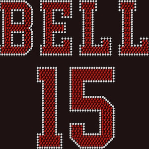 May include: Red rhinestone letters spelling "BELL" with the number "15" below in red rhinestones.