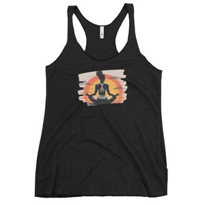 Racerback tank with yoga at sunset design.